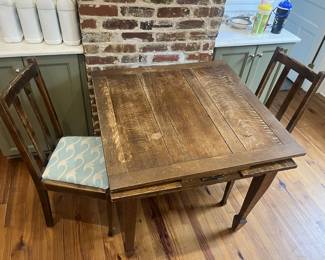 $350; Antique draw-leaf Mission/Arts & Crafts style oak table & four chairs; measures approx. 29" x 36" x 35" (59" with leaves drawn out); good condition with wear commensurate with age and use