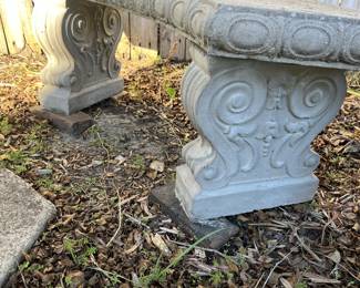 $350; Concrete round garden table w/ two benches; table 26" x 42"; benches 17" x 51" x 17" ea.