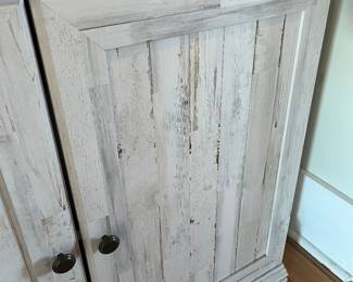 $100; Modern 3-shelf bookcase w/cabinet doors; composite/laminate; approx. 70" x 35" x 12"