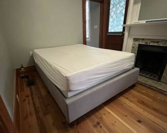$125; Upholstered queen bed frame with mattress; approx. 82" x 62" x 16" H; also available without mattress