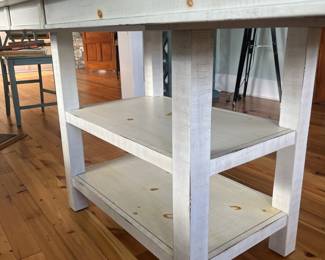$300; Modern farmhouse-style wood table/island; approx. 36" x 72" (including 12" leaf) x 42". Minor wear from use.