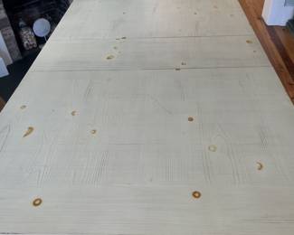 $300; Modern farmhouse-style wood table/island; approx. 36" x 72" (including 12" leaf) x 42". Minor wear from use.