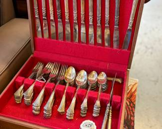 Silver flatware in box. Oneida "Floral Queen" Service for 16