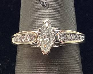14KT WHITE GOLD DIAMOND RING, SIZE 6.75, 0.49ct CENTER DIAMOND, 0.84cts ADJACENT DIAMONDS, 4.4g TOTAL WEIGHT, AIGL APPRAISAL $3,875.00