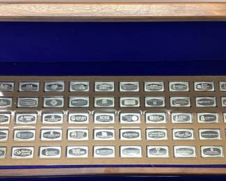 50 STERLING INGOTS 104 TOTAL TROY OZ. BANKMARKED THIS LIMITED EDITION 1972 FRANKLIN MINT "BANKMARKED"COLLECTORS BOX FEATURES 50 STERLING SILVER INGOTS WEIGHING 1000 GRAINS (2.083 TROY OZ) EACH. EVERY INGOT FEATURES A CHOSEN BANK FROM EACH STATE.