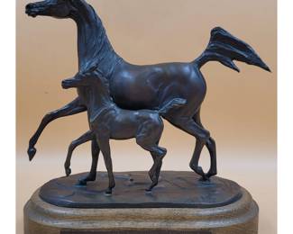 A Jill McKinney Bronze Canadian National Arabian Horse Championship Sculpture of a Mare and Foal.
