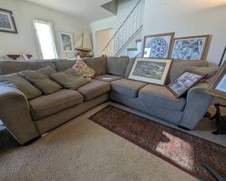 Comfy Ashley sofa and lots of pictures.