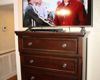 chest of drawers and LG 50" TV