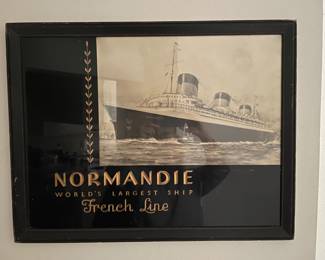 $250.00 Antique reverse painted Normandie advertisement. Very nice, great condition.