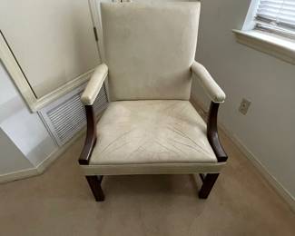 $250.00. Cream leather arm chair