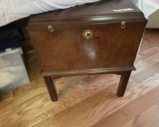 $100. Box on stand with heavy brass side handles