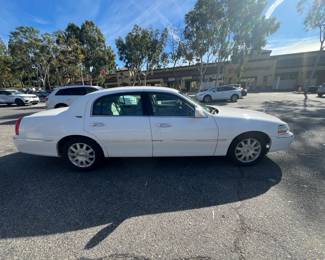 2010 LINCOLN TOWN CAR LIKE NEW! GARAGED DEALER OWNED & THEN ONE OWNER. ONLY 63,000 MILES. INTERIOR AND EXTERIOR EXTREMELY CLEAN. ASKING  $9,500.