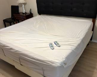 Tempurpedic adjustable bed. Electric w/remotes