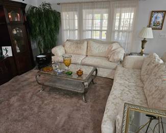 2 Beautiful like new full sized sofas to enjoy drinking red wine on. 