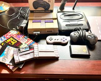 Vintage Super Nintendo and Sega Gaming Systems