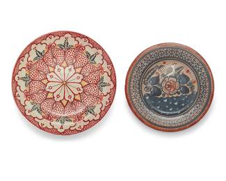 63
Two Mexican polychrome pottery chargers
Late 20th/early 21st century; Guanajuato & Jalisco
Gorky marked to underside: AT [Alfarería Tradicional] / GTO / Mexico; Tonalá marked: Mexico
Comprising one Gorky Gonzalez (1939-2017, Mexican) charger with central floral medallion, and a Tonalá charger depicting a bird and flowers
2 pieces
Gorky: 17.75" Dia. x 3" D; Tonalá: 15.75" Dia. x 1.625" D
Estimate: $300 - $500