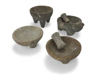 81
Four Mexican carved stone molcajetes
20th century
Comprising four mortars and two pestles
6 pieces
Largest mortar: 5.5" H x 7.75" Dia.
Estimate: $200 - $300
