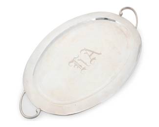 193
A Juventino Lopez Reyes sterling silver tray
Mid-20th century; Mexico
Marked to underside for Juventino Lopez Reyes and: Hecho en Mexico / Sterling / 925 / [Eagle 9] / 15
With opposed lug handles, monogrammed
21.5" W x 12.625" D
35.3 oz. troy approximately
Estimate: $400 - $600