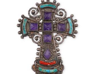 197
A Matl Mexican silver and gem set cross pendant/brooch
Matilde Poulat and Ricardo Salas (c. 1900-d. 1960 & d. 2006)
Circa 1980-2006; Mexico City, Mexico
Stamped: Matl / Mexico / 925 / MS-12
Designed by Matilde Poulat for Matl under the directorship of Ricardo Salas, the articulated sterling silver pendant/brooch with central set amethyst and set coral and turquoise accents, with filigree wire overlay
3" H x 2.375" W
26.0 grams gross
Estimate: $300 - $500