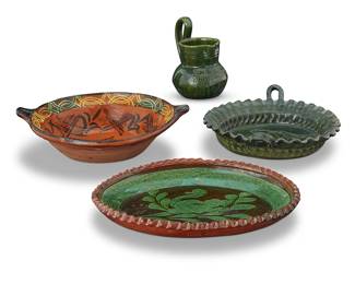 93
A group of Mexican pottery table items
Mid-20th century
Pitcher incised: OAXACA
Comprising a handled serving bowl, a handled greenware bowl with piecrust rim, a greenware pitcher, and an oval bowl with piecrust rim
4 pieces
Largest bowl: 3.625 H x 12.5" W x 11.25" D; Pitcher: 6.375" H x 5.375" W x 4.25" D
Estimate: $200 - $300
