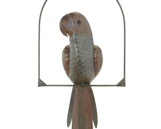 191
A Sergio Bustamante style brass and copper parrot
Mid-20th century
Mounted on a brass perch
2 pieces
Parrot: 23" H x 21" W x 7.5" D approximately; Perch: 20.125" H x 16.75" W
Estimate: $200 - $400