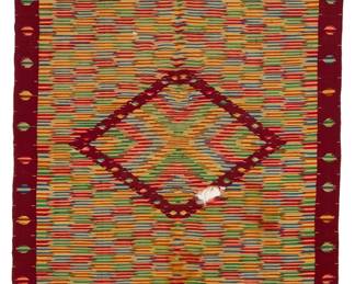 7
A post-Classic Mexican Saltillo sarape textile
Late 19th/ early 20th century; post-Classic period, 1875-1910; possibly San Luis Potosi
Woven with wool weft on cotton warp in a single width with variegated multicolored yarns, with an all-over stepped chevron field featuring an aggregate diamond variant, red border and striped end skirts
80.5" H x 40" W
Estimate: $600 - $800