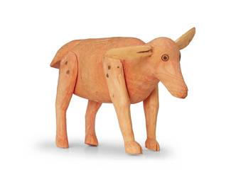 86
Attributed to Manuel Jimenez Ramirez (1919-2005, Mexican)
A carved wood alebrije dog, mid/late 20th century; San Antonio Arrazola, Oaxaca
Unsigned
Carved copal wood
6.375" H x 10.75" W x 5.375" D
Estimate: $400 - $600