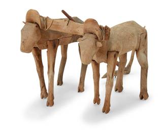 88
Attributed to Manuel Jimenez Ramirez (1919-2005, Mexican)
An early carved wood alebrije oxen group, mid-20th century; San Antonio Arrazola, Oaxaca
Unsigned
Carved copal wood and string
Overall: 12.5" H x 17" W x 10" D approx.; Each figure: 9.25" H x 12" W x 3.125" D approx.
Estimate: $400 - $600