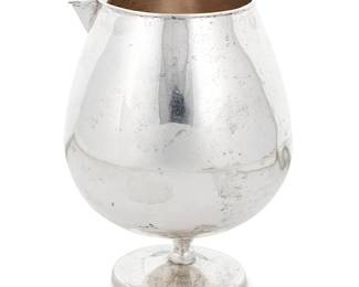 142
A Sanborns sterling silver footed pitcher
Mid-20th century; Mexico City, Mexico
Marked to underside: [Three owls] / Sanborns Mexico / Sterling / [Eagle 22]
6.25" H x 4.75" W x 4.625" D
12.4 oz. troy approximately
Estimate: $500 - $700