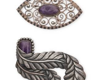 204
Two Mexican silver and set amethyst brooches
Mid-20th century
Variously marked: Taxco / 980 / 101 / Silver / Made in Mexico
Comprising a fanciful chased repoussé sterling silver feather brooch with set amethyst, and an oval filigree brooch with central set amethyst oval cabochon
2 pieces
Feather: 2.75" H x 3.75" W; Filigree: 2" H x 3.625" W
73.6 grams gross
Estimate: $300 - $500