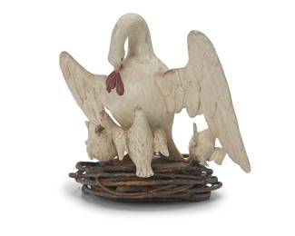 90
A Folk Art carved wood bird figural group
19th/20th century
Unmarked
The painted group depicting a mother feeding her chicks with her own blood, mounted on a natural wood base wrapped in natural wood twigs to form a nest
11.625" H x 14" W x 9.5" D
Estimate: $500 - $700