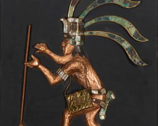 189
A Los Castillo Mayan/Aztec style copper and hardstone wall panel
Mid/late 20th/early 21st century
Unmarked
The hand-wrought copper and brass figure depicted spearing a fish, with inlaid green hardstone accents, mounted to a painted wood backing
Figure: 16.25" H x 12.25" W; Framed: 20.625" H x 14.25" W x 1.75" D
Estimate: $200 - $400