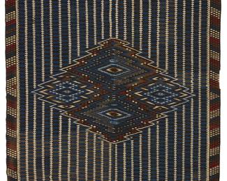 5
A Mexican Saltillo sarape textile
Late 19th century, post-Classic period, 1860-1875; San Miguel de Allende
Woven with wool weft on cotton warp, in two panels seamed down the middle in blue, brown, red, and cream wool with serrated columns and an aggregate serrated diamond to center
77" H x 46" W
Estimate: $2,000 - $3,000