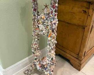 Shell encrusted plant stand 