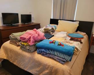 Double bed, linens, 2 t.v.s