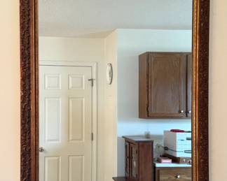 Large gold framed wall mirror