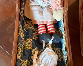 Vintage Raggedy Ann Doll in wooden crib