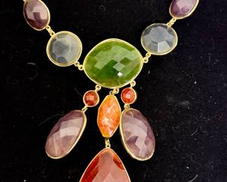 Multi-colored gemstone necklace with gold accents