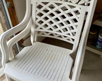 White resin patio chairs with rose lattice back