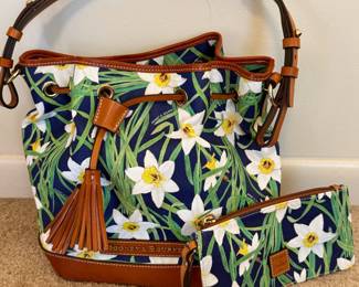 Dooney & Bourke Daffodil drawstring bag with a matching wristlet.