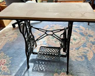 Cast iron sewing machine treadle base with slate top