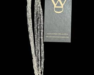 Multi-Strand Silver Necklace with Large Ring Pendant