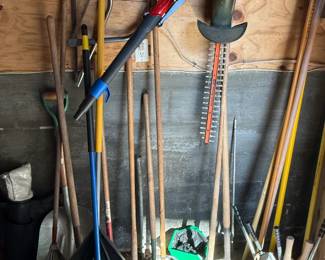 Selection of Yard Tools Including Trimmer and Blower