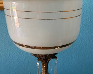 This is a vintage brass and milk glass torchiere table lamp