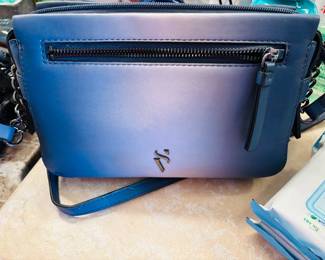 Of course she needs another purse. What were you thinking?