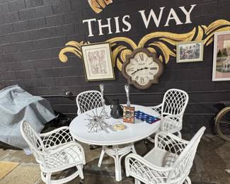 Outdoor rattan table and swivel caster chairs set