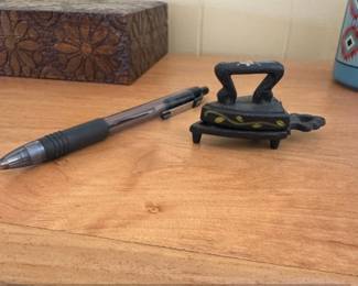 Cast Iron Miniature Sad Iron with Floral Decoration and Trivet