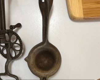 Vintage Kitchen Utensil Set Potato Masher, AJ Egg Beater, and Cast Iron Citrus Juicer fourth image