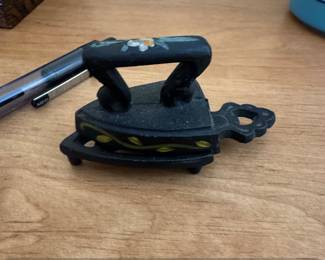 Cast Iron Miniature Sad Iron with Floral Decoration and Trivet second image