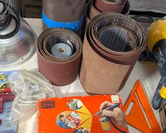 Sanding belts and vintage airbrush paint kit